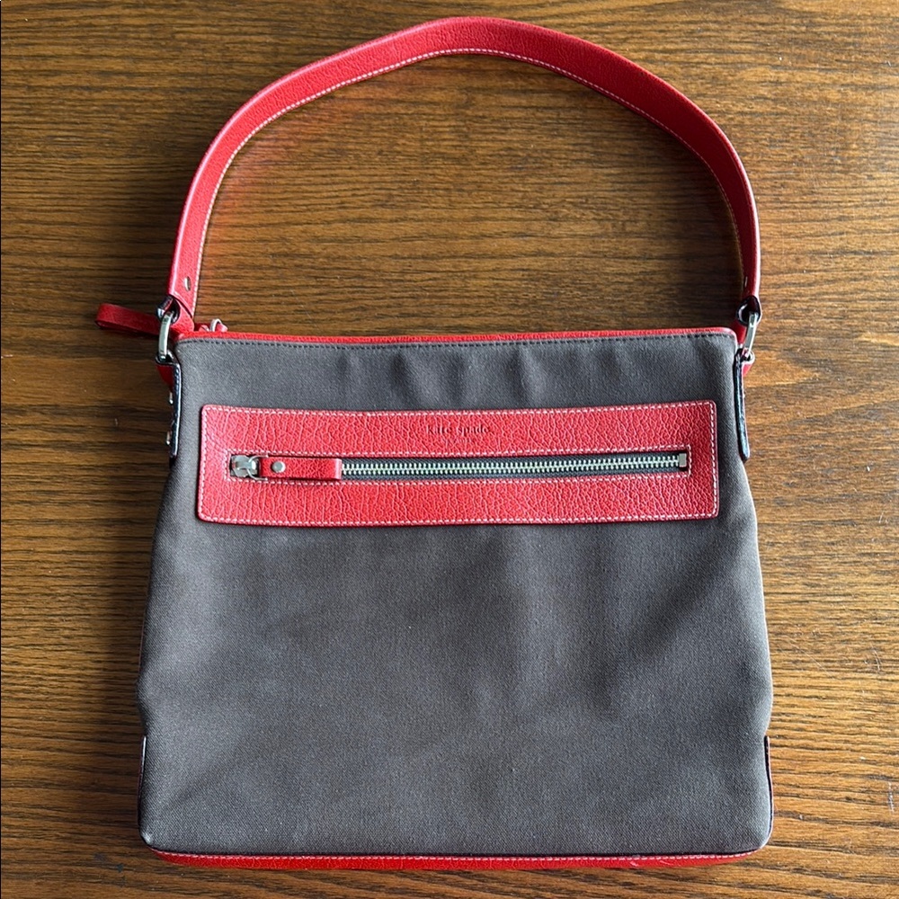 Kate Spade chocolate brown canvas/red leather top zipper bag w outside pocketEUC